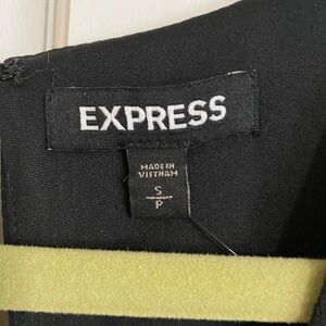 Long sleeve, black express dress. Deep v